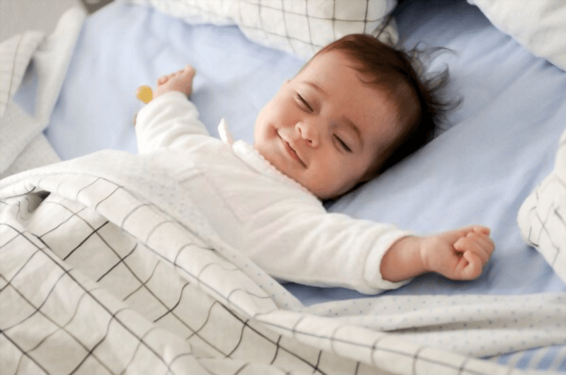 3 week old baby laughing in sleep